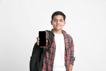 Indian college student showing mobile screen on white background.
