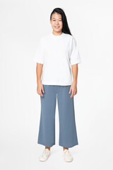 Sticker - Woman in white tee and blue loose pants minimal fashion