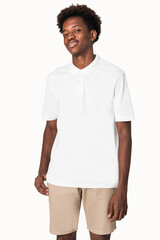 Wall Mural - African American teenager in white polo t-shirt youth apparel shoot