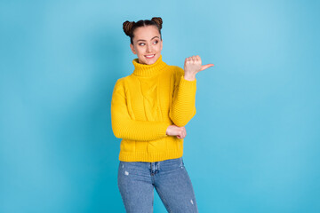 Sticker - Portrait of attractive cheerful girl demonstrating copy space ad select idea isolated over bright blue color background