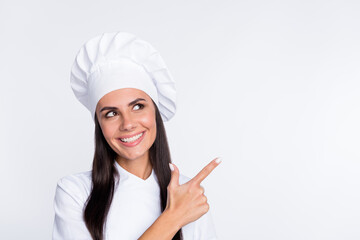 Wall Mural - Portrait of charming cheerful person look interested direct finger empty space feedback isolated on white color background