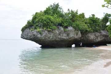 rock in the middle of the sea