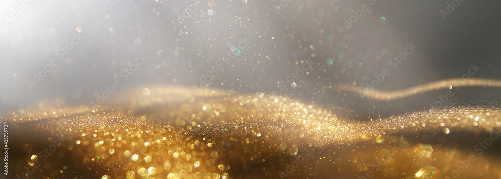 background of abstract gold and black glitter lights. defocused - obrazy, fototapety, plakaty 