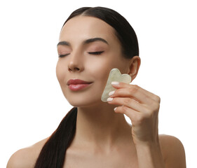 Wall Mural - Beautiful young woman doing facial massage with gua sha tool on white background