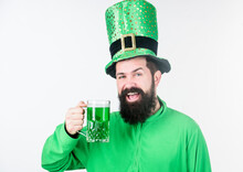 Colored Beverage Patricks Holiday. Green Color Part Of Celebration. Irish Beer Pub. Global Celebration Irish Culture. Man Bearded Hipster Hat Patricks Day Drink Pint Beer. Saint Patricks Day Holiday