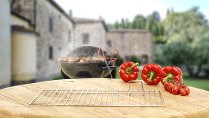 Wall Mural - Table background of free space and grill in garden 