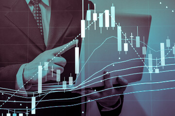 Financial data in term of a digital prices on LED display. A number of daily market price and quotation of prices chart to represent candle stick tracking in Forex trading.