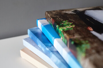 canvas prints stacked on white surface. photo printed on canvas
