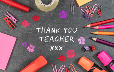 Thank you teacher text background with colorful school supplies.