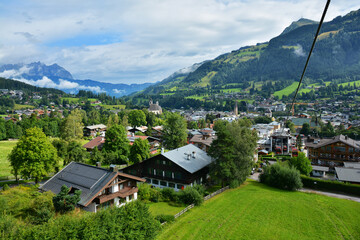 Wall Mural - View of the Kitzbuhel town seen from cable car who lift up to Hahnenkamm ski run, Kitzbuhel, Tirol, Austria