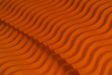 Wall Mural - Orange luminescent background.Abstract  wavy texture ..