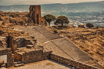 Wall Mural - The ruins of Pergamon, with the Asclepion where Hippocrates started his works.  Amphitheater and  watchtower on top of a hill in Pergamon ancient city. 