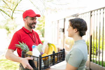 Wall Mural - Woman ordered a home delivery from the supermarket