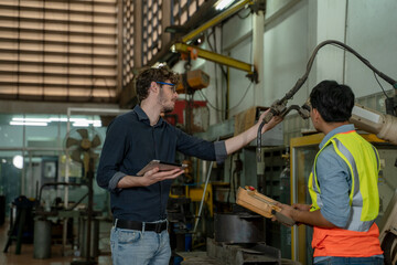 Aufkleber - Factory engineer working together and having discussion in factory,Technical specialist mechanics at heavy industry factory concept.