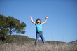 © Volodymyr - Happiness, childhood, freedom, movement and people concept - happy smiling boy jumping.