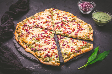 Wall Mural - Tart flambee (Flammkuchen) with ramson sour cream, onion and bacon