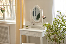 Portrait Of Vintage Vanity Table Set With Stool And Mirror