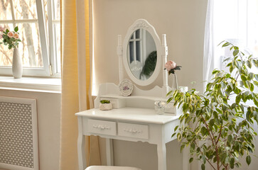 portrait of vintage vanity table set with stool and mirror