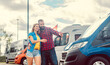 © Kzenon - Couple looking for camper or RV on yard of dealer