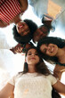 © etonastenka - Multi-ethnic people look down and smile. The concept of friendship of different peoples