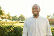 © etonastenka - Happy smiling man outdoors. Outdoor portrait of smiling young african man on the park