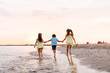 © Pixel-Shot - Little children having fun on sea beach