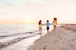 © Pixel-Shot - Little children having fun on sea beach
