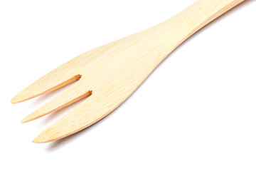 Wooden fork on white background