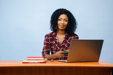 Wall Mural - beautiful african business woman isolated over whit background feeling excited