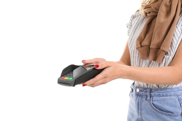 Wall Mural - Young woman with payment terminal on white background