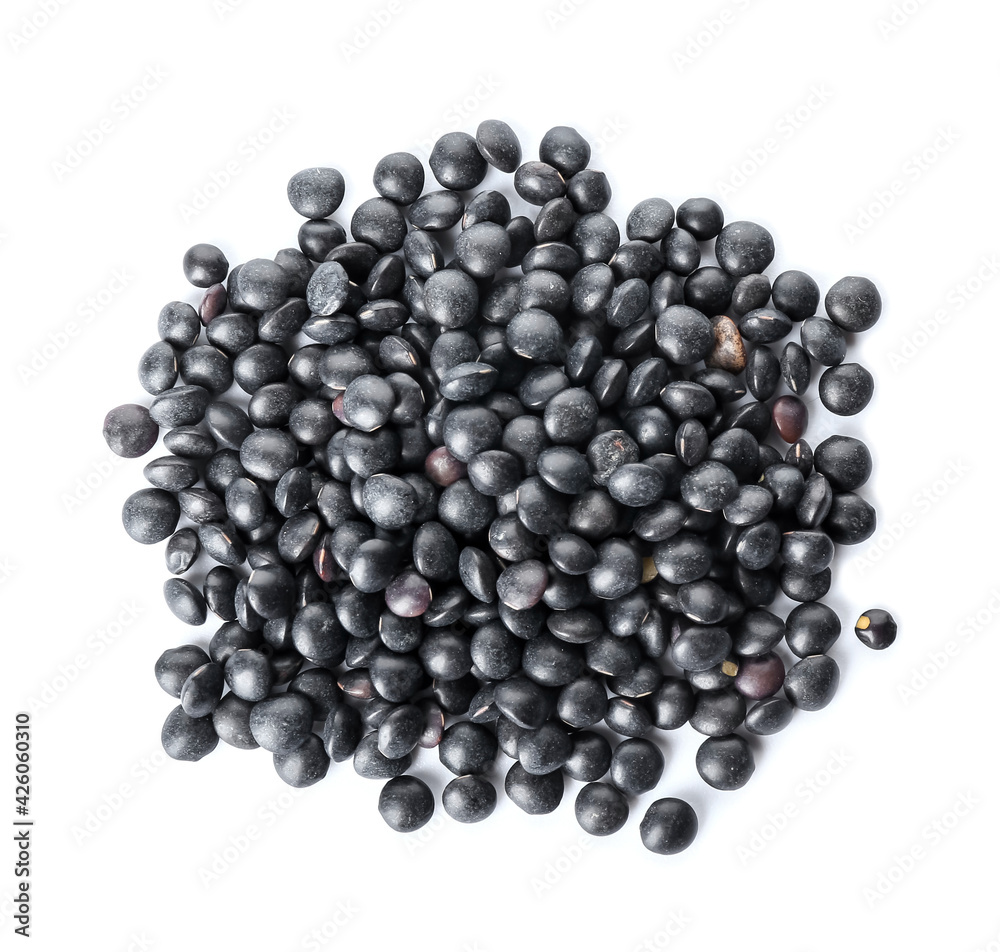Black lentils on white background