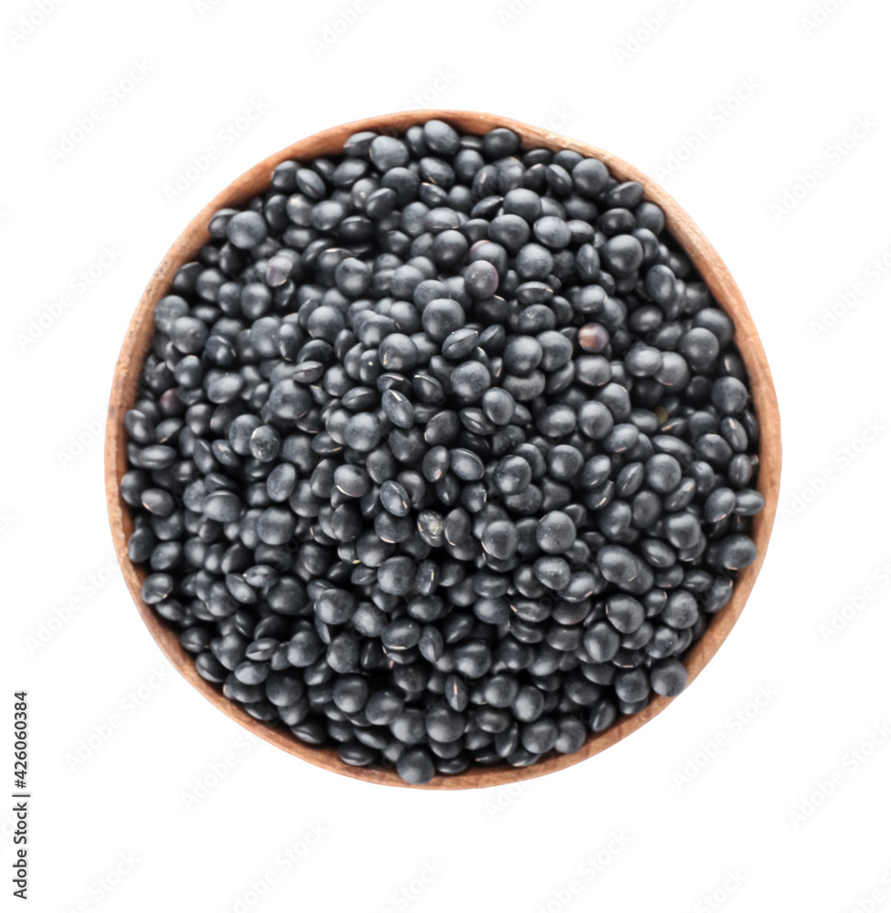 Bowl with black lentils on white background