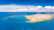 © robertharding - Old town and harbor of Gallipoli on a sunny summer day, aerial view, Lecce province, Salento, Apulia, Italy