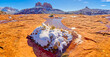 © robertharding - Snow covered Cathedral Rock in Sedona viewed from a sandstone plateau along Secret Slick Rock Trail, Arizona, United States of America