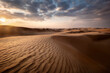 © robertharding - Sand dunes at sunset in the Wahiba Sands desert with clouds in the sky, Oman, Middle East