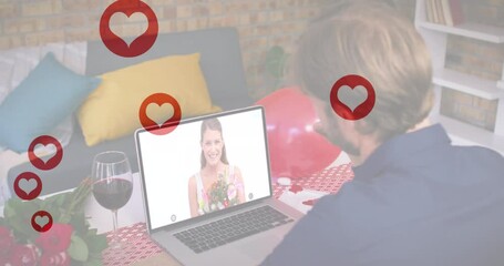 Poster - Multiple red heart icons floating over caucasian man waving while having a video call on laptop