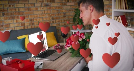 Poster - Red heart icons over caucasian man holding a flower bouquet while having a video call on laptop