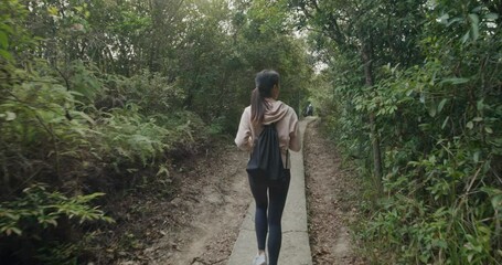 Canvas Print - Asian woman go hiking in the forest