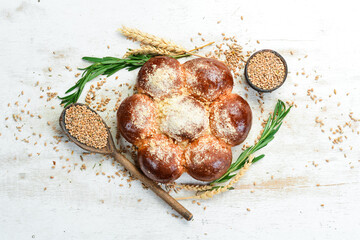 Fragrant sweet buns from flour. Baking from rye and flour. Top view.