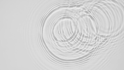 Poster - Up close, top view, Slow motion various waves of the water surface hitting the sun's rays, making them sparkle according to different patterns on a gray background video 4K.