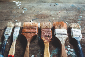 brushes on wooden background