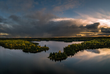 an aerial view in autumn of forest lake in northwest ontario, canada.