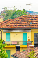 Nice mediterranean house roofs with different colours in Mestre, Venice, Italy.