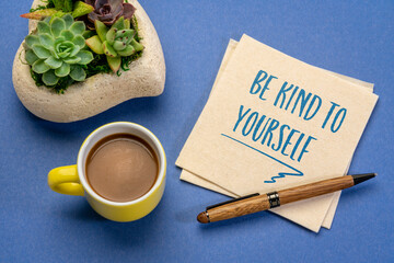 Wall Mural - be kind to yourself - inspirational handwriting on a napkin with a cup of coffee, self care concept