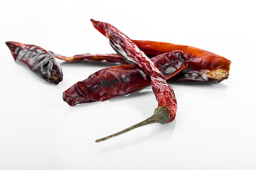 Wall Mural - Dry red chili pepper. Dry red chili pepper  on white background. Long chili pepper