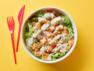 Sticker - caesar salad with fried chicken meat