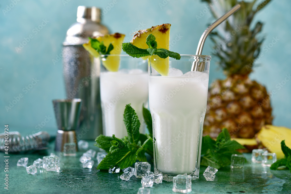 Pina colada - coconut and pineapple cocktail with cream. - obrazy, fototapety, plakaty 