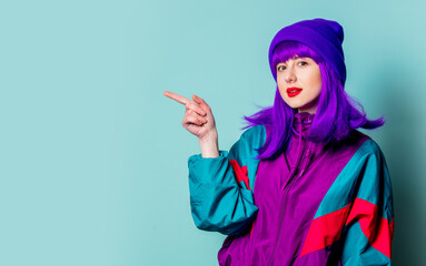 Wall Mural - White girl with purple hair and 80s tracksuit on blue background