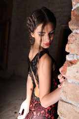 Wall Mural - Vertical shot of a beautiful young Caucasian lady wearing an evening dress