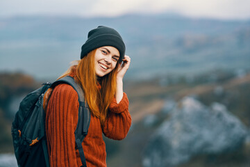 Wall Mural - cheerful woman hiker mountains nature landscape travel vacation